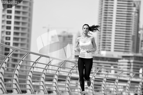 Image of woman jogging at morning