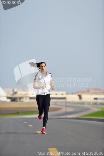 Image of woman jogging at morning