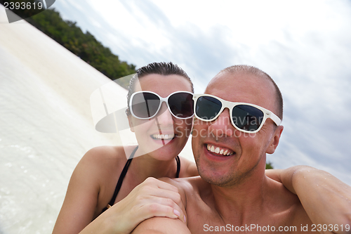 Image of happy young couple have fun on summer
