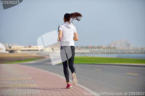 Image of woman jogging at morning