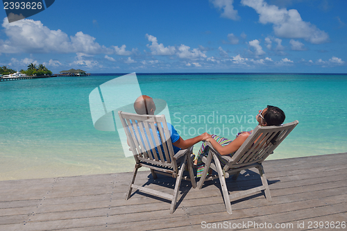 Image of happy young couple have fun on summer
