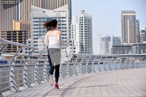 Image of woman jogging at morning