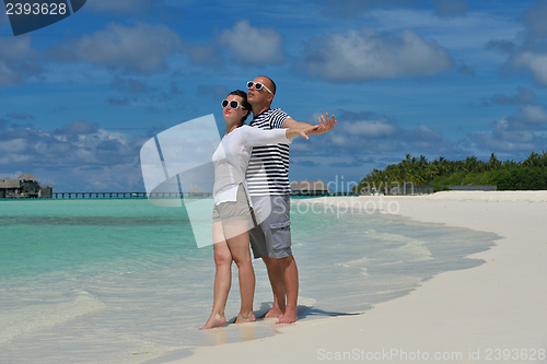 Image of happy young couple have fun on summer