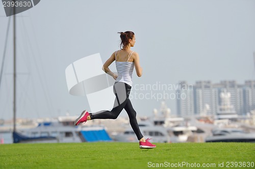 Image of woman jogging at morning