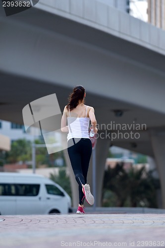 Image of woman jogging at morning