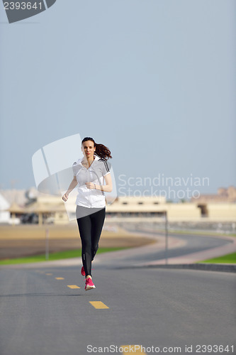 Image of woman jogging at morning
