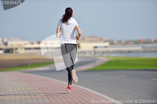 Image of woman jogging at morning