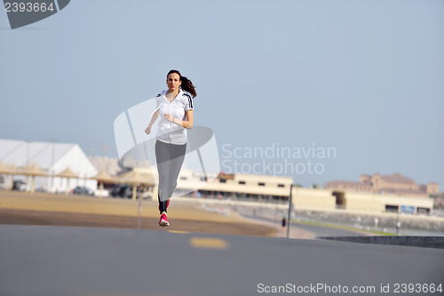 Image of woman jogging at morning