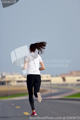 Image of woman jogging at morning