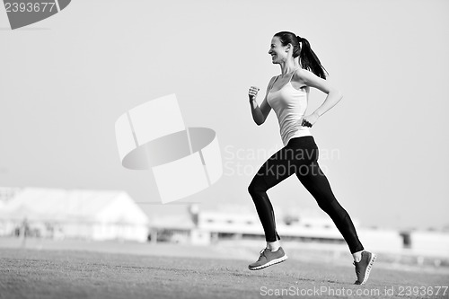 Image of woman jogging at morning
