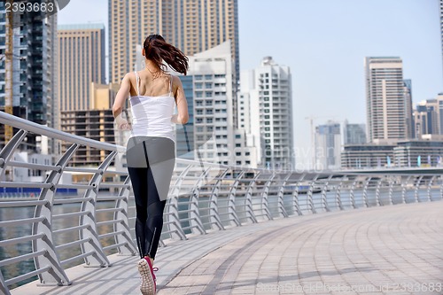 Image of woman jogging at morning