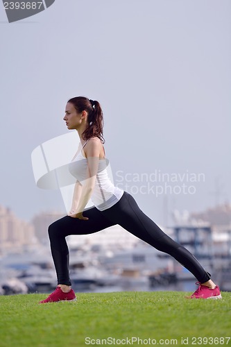 Image of Young beautiful  woman jogging  on morning