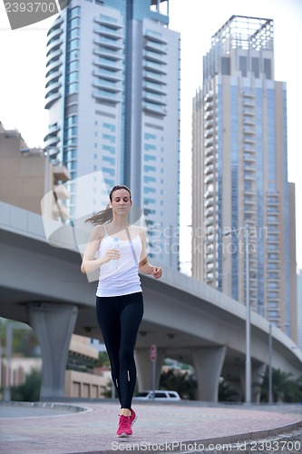 Image of woman jogging at morning