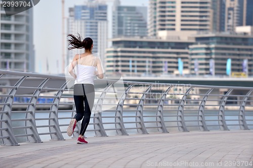 Image of woman jogging at morning
