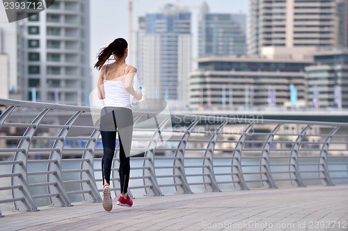 Image of woman jogging at morning