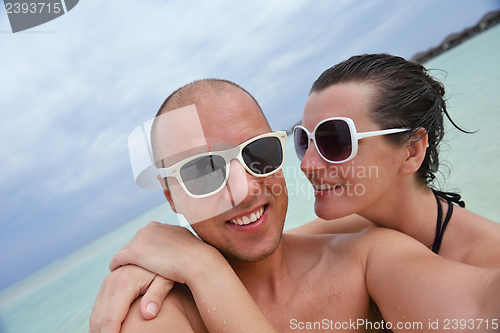 Image of happy young couple have fun on summer