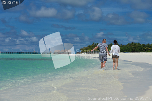 Image of happy young couple have fun on summer