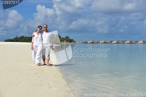 Image of happy young couple have fun on summer