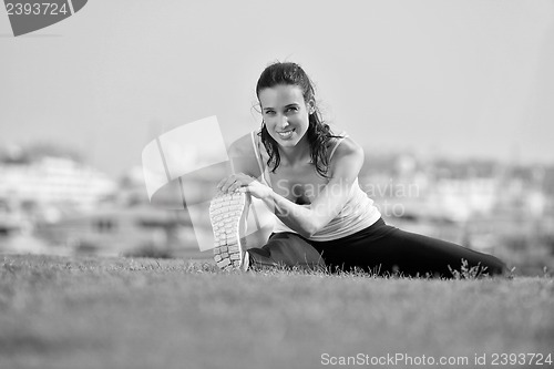 Image of Young beautiful  woman jogging  on morning