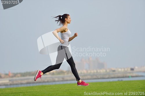 Image of woman jogging at morning