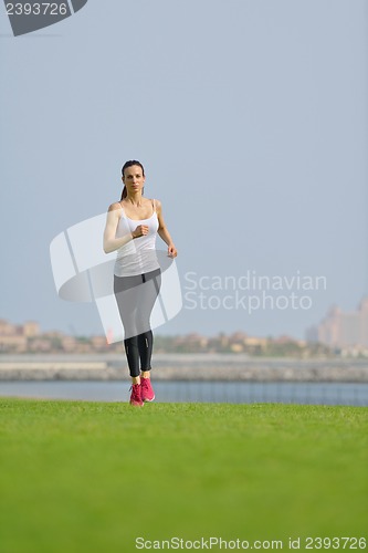 Image of woman jogging at morning