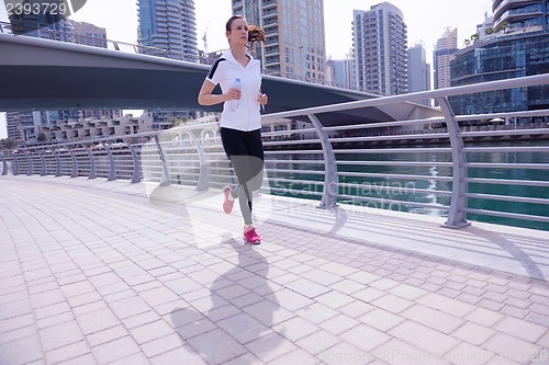 Image of woman jogging at morning