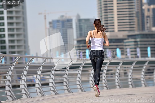 Image of woman jogging at morning