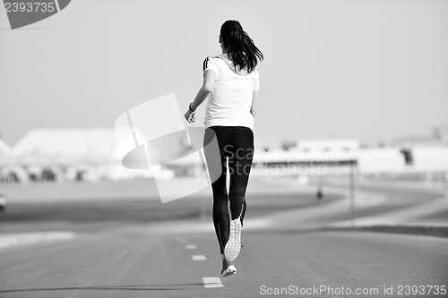 Image of woman jogging at morning