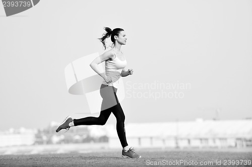 Image of woman jogging at morning