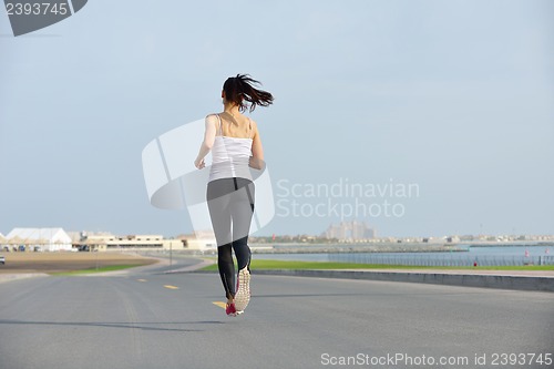 Image of woman jogging at morning