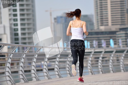 Image of woman jogging at morning