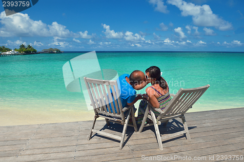 Image of happy young couple have fun on summer