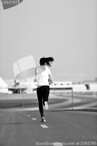 Image of woman jogging at morning