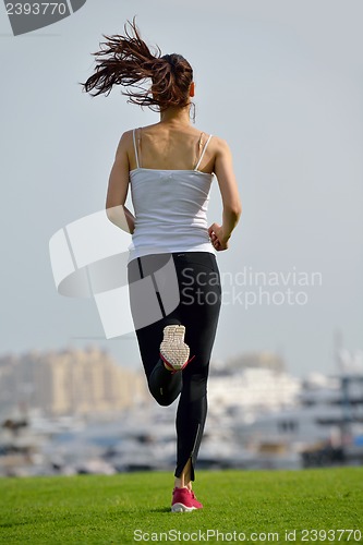 Image of woman jogging at morning