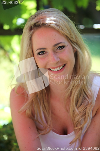 Image of Happy friendly blond woman