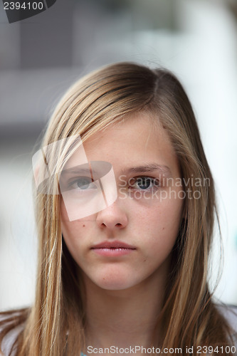 Image of Young teenage girl with a serious expression