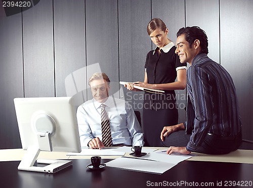 Image of Business people working on computer 