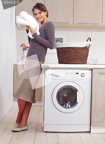 Image of woman on washing machine