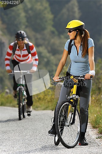 Image of women biking on road