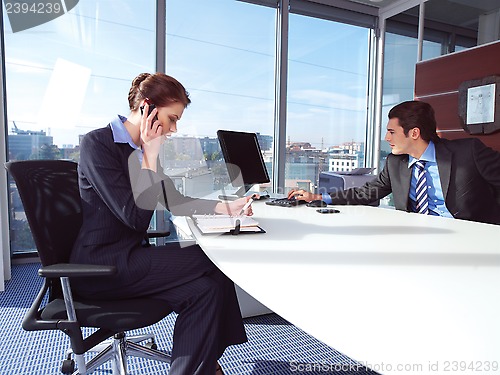 Image of Woman calling on mobile phone b