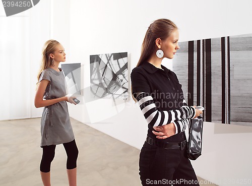 Image of women at an exhibition 