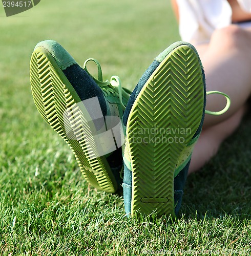 Image of green sole of shoes l