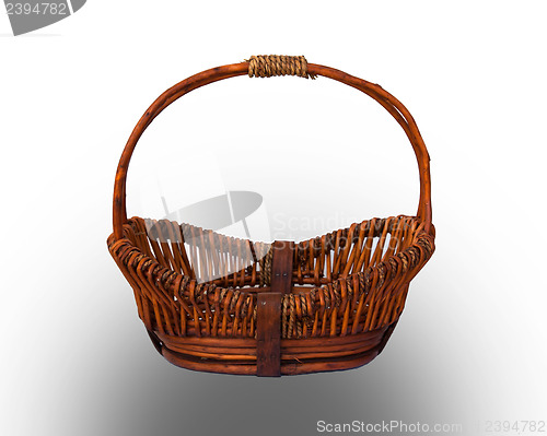 Image of Round brown wicker basket with handle