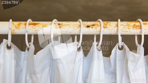 Image of White shower curtain in the bathroom