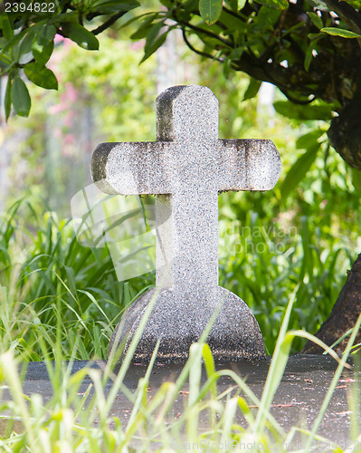 Image of Cross on tombstone