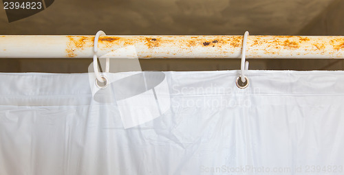 Image of White shower curtain in the bathroom