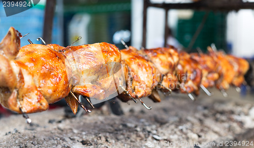 Image of grilled chicken roasted on a spit