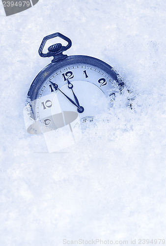 Image of Pocket watch in snow, Happy New Year greeting card