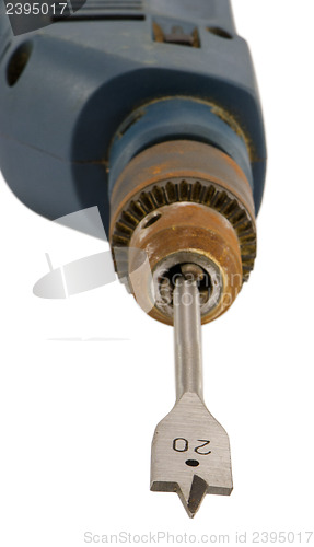 Image of retro rusty electric drill tool wood bit closeup 