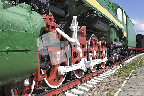 Image of Wheel a big old steam locomotive